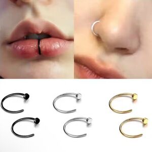 Set of Black, Silver, and Gold Nose and Lip Rings